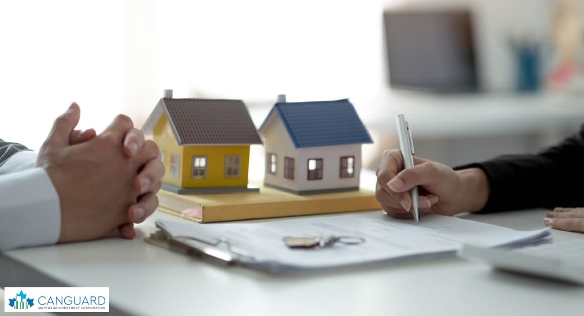 A picture of a man and some house models shows the profitability of real estate investing.