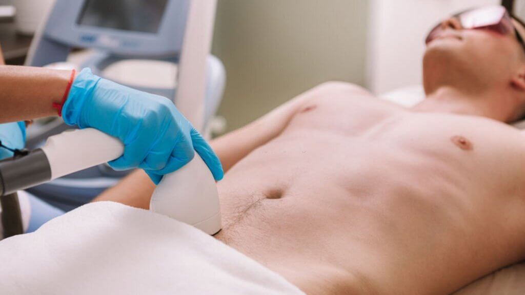 Man getting IPL hair removal at a beauty clinic