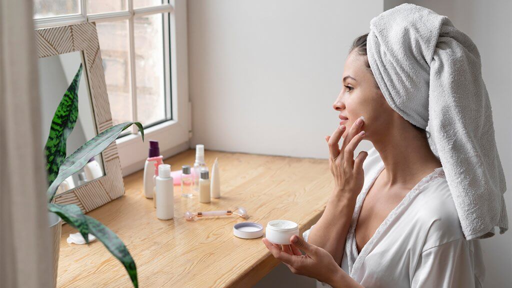 Young woman doing self care routine at home