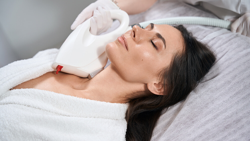Skin resurfacing with IPL on woman's neck