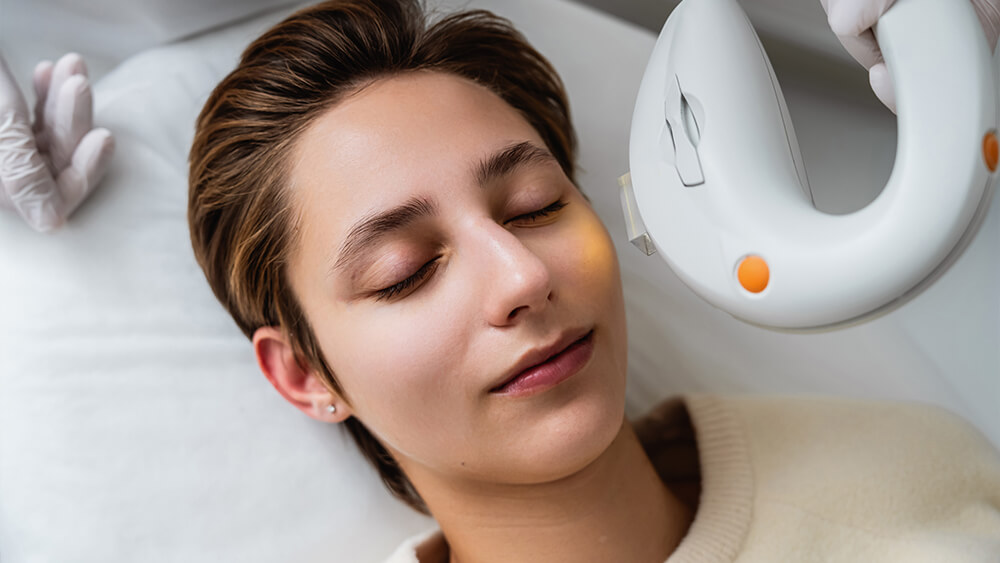 Woman during a laser rejuvenation treatment with IPL