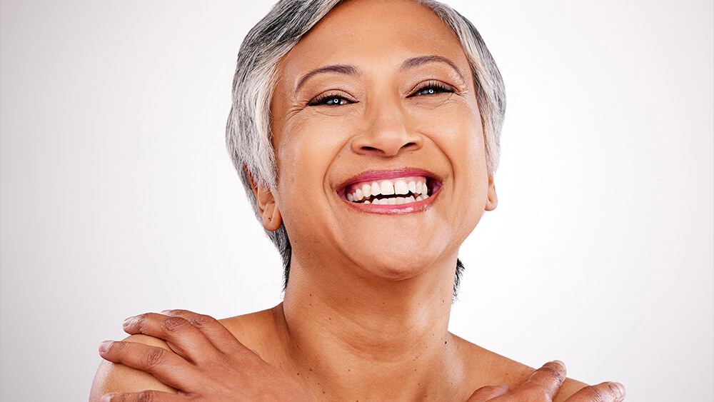 Beauty studio portrait and mature happy woman