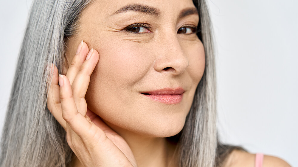 Closeup portrait of Asian mature woman's face