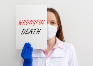 Doctor holding up wrongful death sign