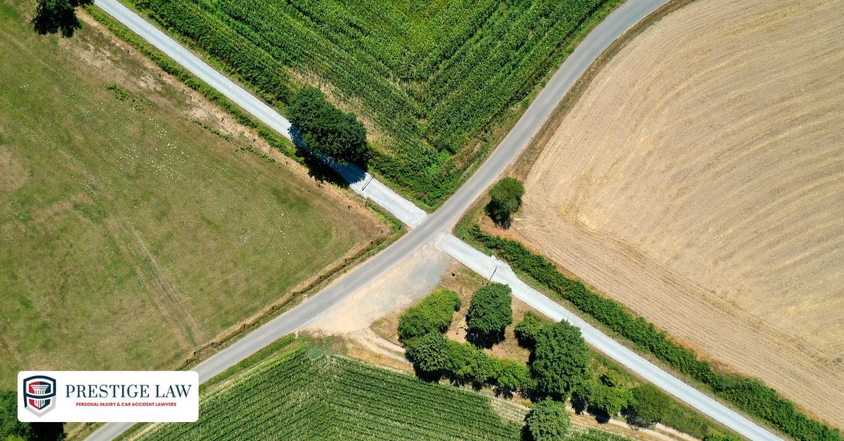 A four-way intersection with stop signs in all directions.